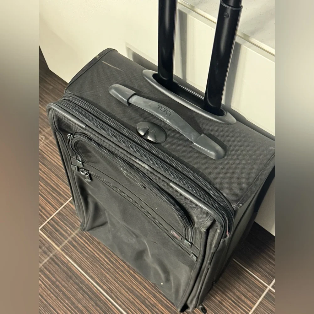 Tumi Black Rolling Carry-On Travel Bag